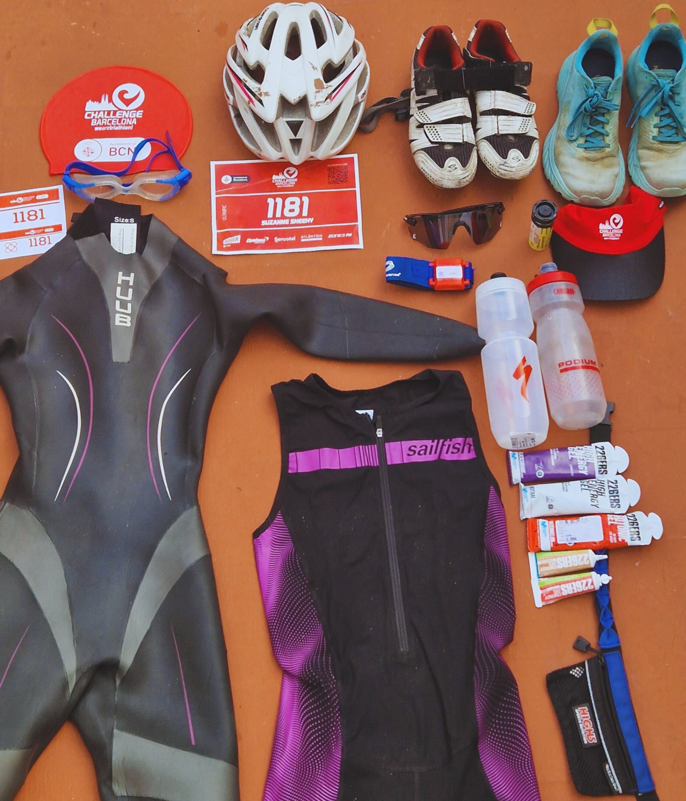 Flat lay of triathlon race gear neatly arranged for the Barcelona Triathlon