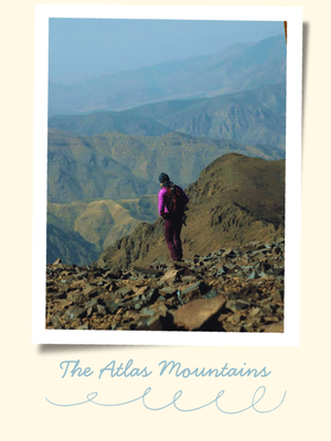 Descending from the Toubkal summit, the highest peak in North Africa, overlooking the Atlas Mountains.